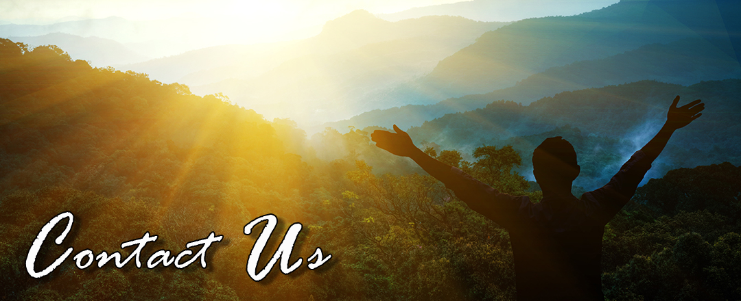 photo of man in front of mountain range at sunrise with caption Contact Us